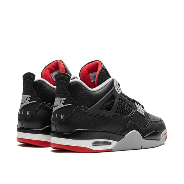 Black and red Nike Air Jordan sneakers on a white background