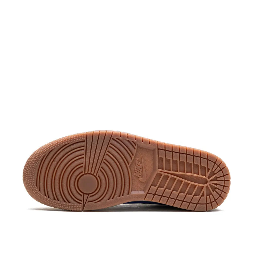 Brown sole of a shoe on a white background