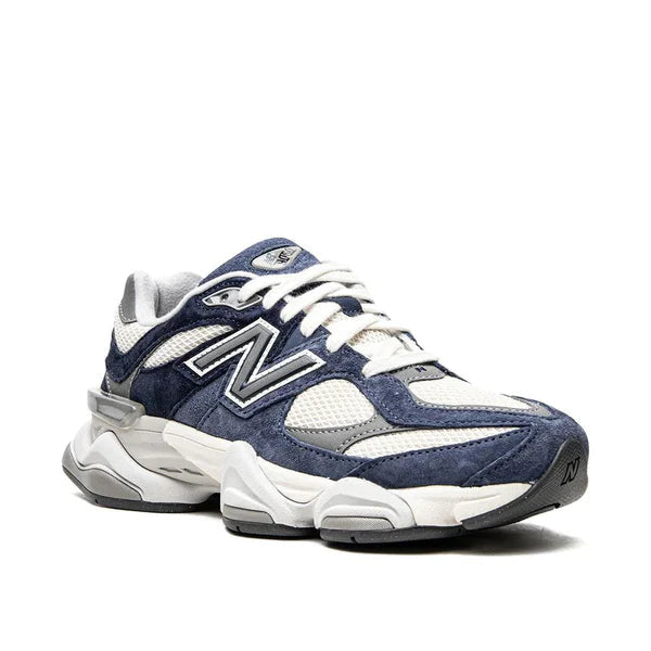 Navy and white sneaker on a white background